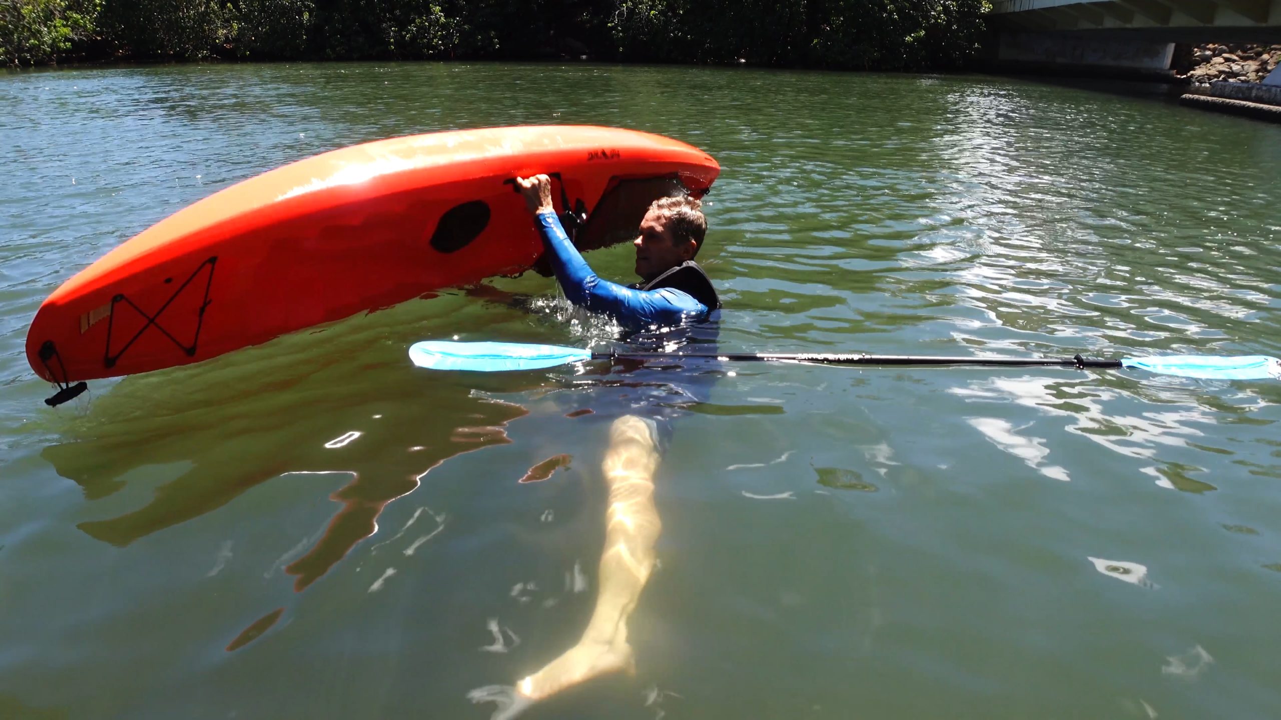 a person rowing a boat in the water